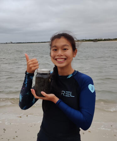Collecting macroalgae samples for epiphytic assemblage at Radio Island